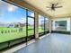 Relaxing screened patio offering backyard views at 19492 Fort King Run, Brooksville, FL 34601