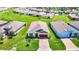 Property view showing a house with a brick paver driveway at 19492 Fort King Run, Brooksville, FL 34601