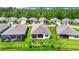 Aerial view of houses in a community at 19492 Fort King Run, Brooksville, FL 34601