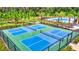 Aerial view of four well-maintained pickleball courts at 19492 Fort King Run, Brooksville, FL 34601