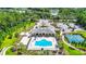 Community pool, clubhouse, tennis courts, and parking at 19492 Fort King Run, Brooksville, FL 34601