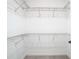 Walk-in closet with wire shelving at 19492 Fort King Run, Brooksville, FL 34601
