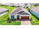 Single-story home in a residential neighborhood at 19492 Fort King Run, Brooksville, FL 34601