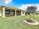 House with a large backyard and screened patio at 19492 Fort King Run, Brooksville, FL 34601