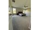 Large bedroom with carpeted floors and plenty of natural light at 15434 Miller Creek Dr, Sun City Center, FL 33573
