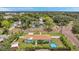 Aerial view of a charming light teal home with a spacious backyard at 800 61St N St, St Petersburg, FL 33710