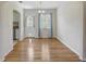 Bright dining room with hardwood floors and view into kitchen at 800 61St N St, St Petersburg, FL 33710