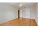 Hardwood floor bedroom with two closets and ceiling fan at 800 61St N St, St Petersburg, FL 33710