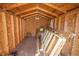 Interior of a wooden storage shed with building materials at 800 61St N St, St Petersburg, FL 33710