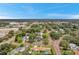 Aerial view showing home's location in a residential neighborhood with mature trees at 800 61St N St, St Petersburg, FL 33710