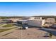 Expansive aerial view of the school showcasing its architecture and vast parking area at 3893 Burdick Loop, Odessa, FL 33556