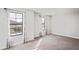 Spacious bedroom with two windows with curtains, offering lots of natural light at 3893 Burdick Loop, Odessa, FL 33556