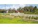 Community entrance showcasing the 'Starkey Ranch' sign surrounded by lush landscaping at 3893 Burdick Loop, Odessa, FL 33556