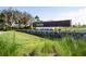 Welcome to Starkey Ranch with lush landscaping and stone wall at 3893 Burdick Loop, Odessa, FL 33556