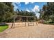 Spacious playground featuring swings and a slide, perfect for Gathering fun at 3893 Burdick Loop, Odessa, FL 33556