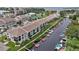 Scenic aerial view of waterfront condos with boat docks and lush landscaping along the canals at 8210 Aquila St # 227, Port Richey, FL 34668
