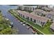 Aerial view of condos with boat docks, water views, and beautifully landscaped grounds at 8210 Aquila St # 227, Port Richey, FL 34668