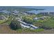 Aerial view of a residential community, boat storage, and waterways at 8210 Aquila St # 227, Port Richey, FL 34668