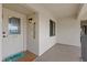 Welcoming condo entrance with nautical decor and a view of the waterfront at 8210 Aquila St # 227, Port Richey, FL 34668