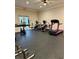 Modern gym with a variety of exercise equipment to meet your fitness needs at 8210 Aquila St # 227, Port Richey, FL 34668