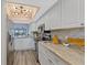 Modern kitchen features stainless steel appliances, stone countertops, and stylish lighting at 8210 Aquila St # 227, Port Richey, FL 34668