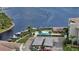 View of the community pool and boat docks by the bay for access to boating and waterfront living at 8210 Aquila St # 227, Port Richey, FL 34668