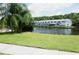 Community features waterfront access with lush landscaping at 20890 Negril Ct # R3, Lutz, FL 33558