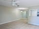 Dining area with tile floors and a modern light fixture at 8141 Bugle Ct # 1, Port Richey, FL 34668
