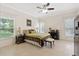 Main bedroom with sliding doors to patio at 2952 Wood Pointe Dr, Holiday, FL 34691