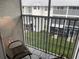 Relaxing balcony overlooking a grassy courtyard at 21146 Fountain View Ln # 4302, Lutz, FL 33558