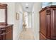 Well-lit hallway with ample storage space at 4309 Hunters Pass, Spring Hill, FL 34609