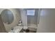 Clean bathroom with a bathtub and updated vanity at 3814 Holiday Lake Dr, Holiday, FL 34691