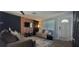Bright living room with modern wall decor and comfy seating at 3814 Holiday Lake Dr, Holiday, FL 34691