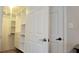 Large walk-in closet with built-in shelving and drawers at 3814 Holiday Lake Dr, Holiday, FL 34691