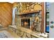 Cozy stone fireplace with wood-burning insert at 7504 Cypress Knee Dr, Hudson, FL 34667