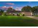 Beautiful home exterior at dusk at 9410 Fox Hollow Ln, Weeki Wachee, FL 34613