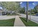 Residential street with mature trees and sidewalks at 6642 Stewart N Ave, St Petersburg, FL 33702