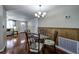 Bright dining area with glass-top table and four chairs at 6642 Stewart N Ave, St Petersburg, FL 33702
