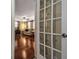 View of living room with hardwood floors and comfortable seating at 6642 Stewart N Ave, St Petersburg, FL 33702