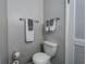 Clean bathroom with toilet, vanity, and updated fixtures at 6635 Stewart N Ave, St Petersburg, FL 33702