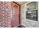 Inviting front door entrance with brick and stone facade at 6635 Stewart N Ave, St Petersburg, FL 33702
