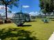 playground featuring unique spherical and seesaw structures at 6635 Stewart N Ave, St Petersburg, FL 33702