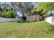 House with attached garage and screened porch, large backyard at 6635 Stewart N Ave, St Petersburg, FL 33702