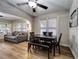 Light-filled dining area with a wooden table and bench at 6635 Stewart N Ave, St Petersburg, FL 33702