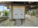 Unfinished basement with large white door and ramp at 14904 Old Dixie Hwy, Hudson, FL 34667