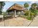 Elevated home with a wrap-around deck and lush landscaping, offering ample outdoor space at 14904 Old Dixie Hwy, Hudson, FL 34667