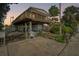 Elevated home with a deck, stairs, and a spacious yard at 14904 Old Dixie Hwy, Hudson, FL 34667