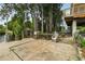 Concrete dock area with a table and chair, ideal for outdoor dining and relaxation at 14904 Old Dixie Hwy, Hudson, FL 34667