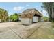 Elevated home with spacious deck and storage shed at 14904 Old Dixie Hwy, Hudson, FL 34667