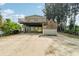 Elevated home with large deck and ample parking at 14904 Old Dixie Hwy, Hudson, FL 34667